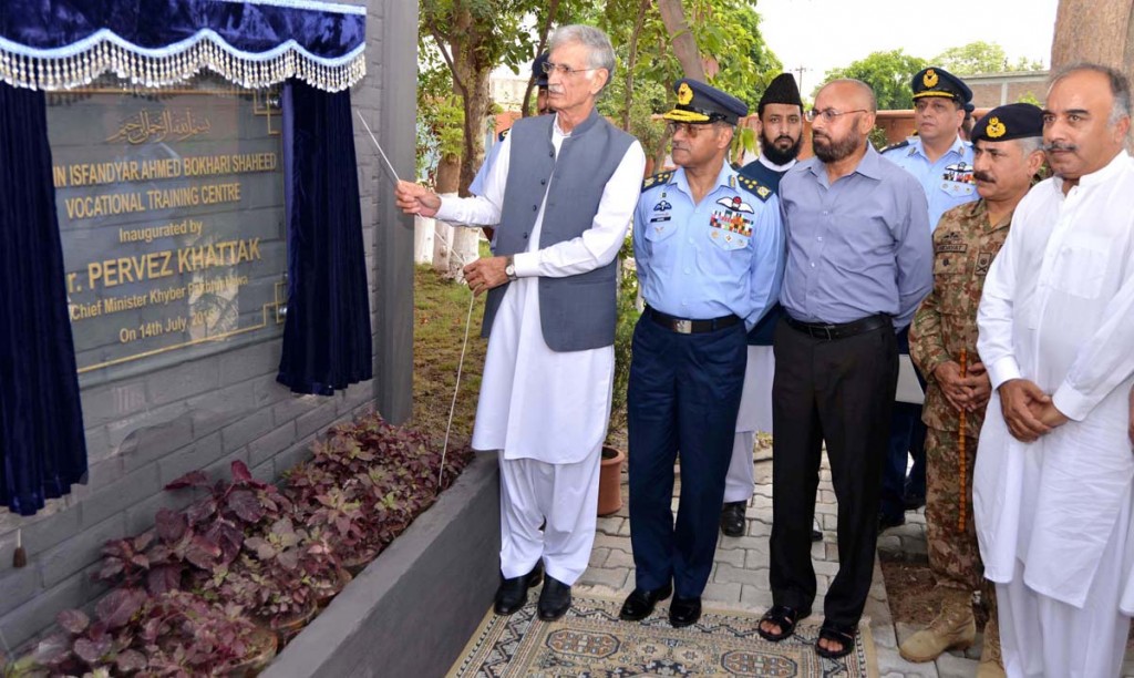CM KPK Pervez Khattak unveiling the plaque to formally inaugurate Captain Isfandyar Ahmad Bukhari Shaheed Vocational Training Centre during his visit to Badaber Air Base. Air Chief Sohail Aman, Core Commander Peshawar Lt. Gen Hidayatur Rehman are also present.