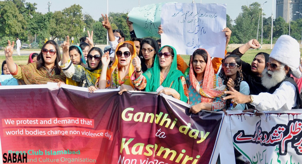 Mishal Malik, wife of Hurriyat leader Yasin Malik protesting against the Indian aggression outside of National Press Club in Islamabad on Sunday. - SABAH