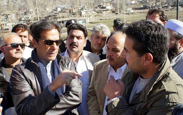 Chairman PTI Imran Khan talking to KP Party leaders in Swat on Friday. - DNA