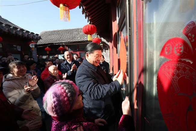 Xi visits cadres, residents in Beijing ahead of Spring Festival