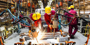 China’s industrial profits rebound in 2021 as production improves