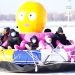 People enjoy ice-snow fun on an entertainment facility on the frozen Songhua River in Harbin, northeast China’s Heilongjiang Province.