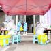 Medical workers take swab samples from citizens for nucleic acid test  at a COVID-19 testing site in Zhengzhou, central China’s Henan Province