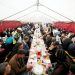 People have charitable iftar meals during the Islamic holy month of Ramadan in Algiers