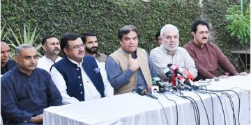SAPM Hanif Abbasi addressing a press conference