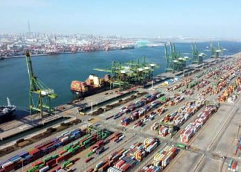 China vows to open its door wider to world