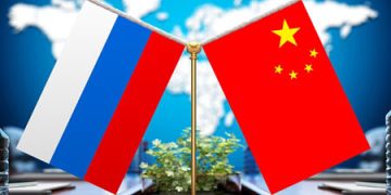 Xi talks with  Putin over phone