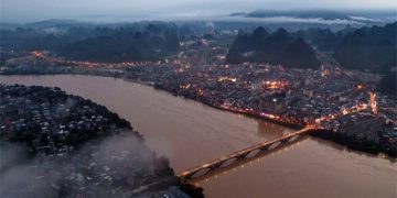 China raises emergency response level for flood control