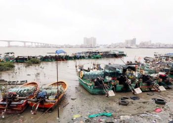 China raises emergency response for typhoon, flood