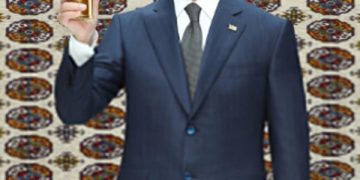 Sardar Berdimuhamedov  attends automobile bridge  foundation laying ceremony